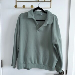 TWIK | Quarter Polo Oversized Sweater